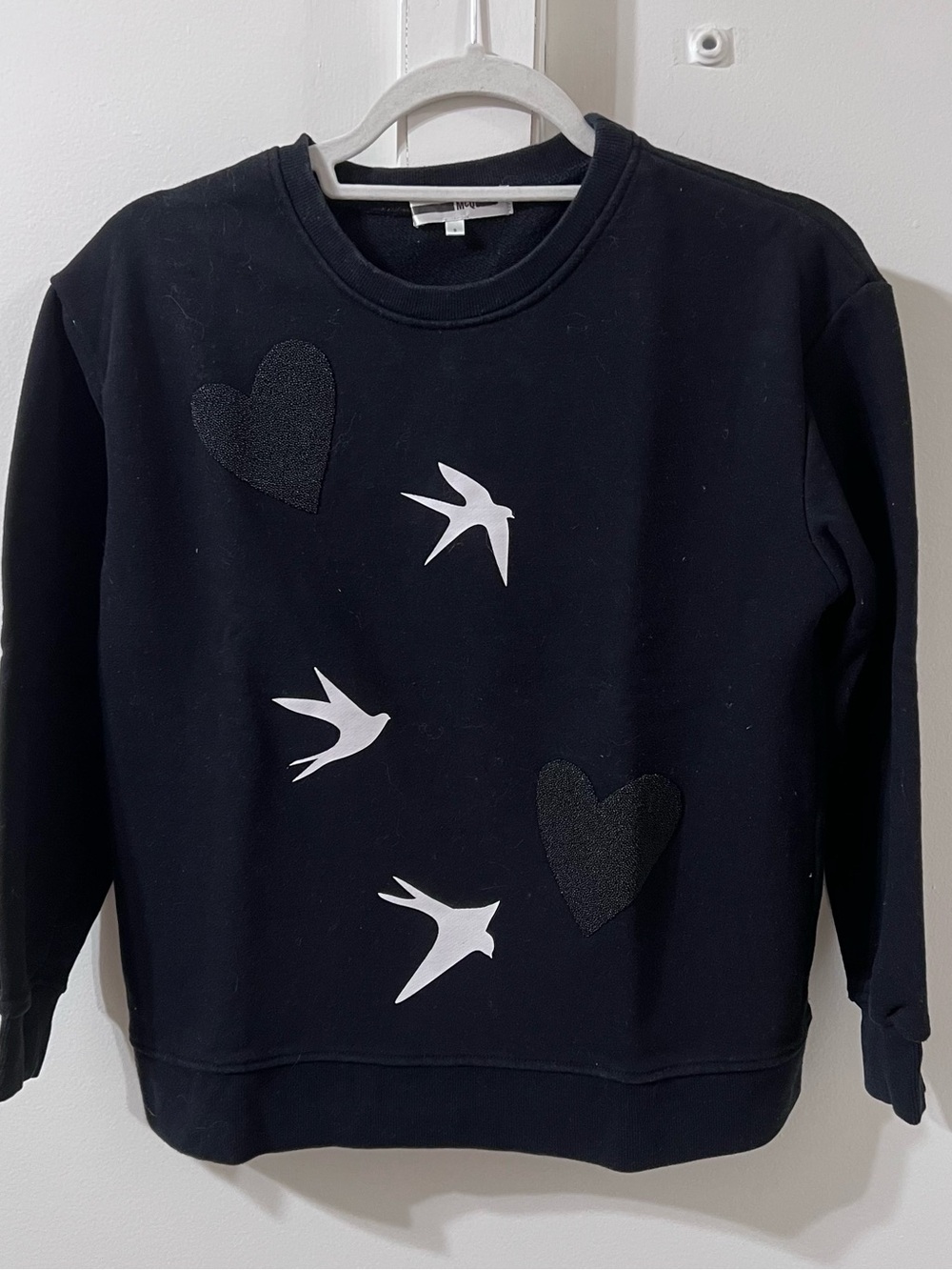 McQ by Alexander McQueen Black Crewneck Sweater with Swallow and Heart Appliqués